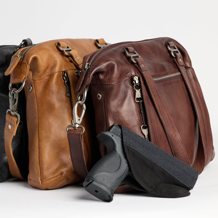 Black, cognac, and brown full-grain leather Athena concealed carry tote bags by Confident Conceal