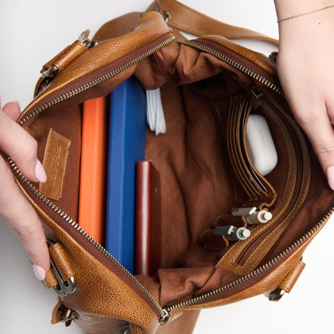 Stuffed interior view of full-grain leather Athena concealed carry tote bag by Confident Conceal