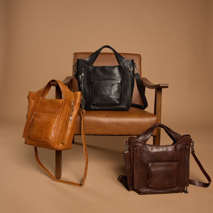 Cognac, black, and brown full-grain leather Ava concealed carry tote crossbody bags by Confident Conceal
