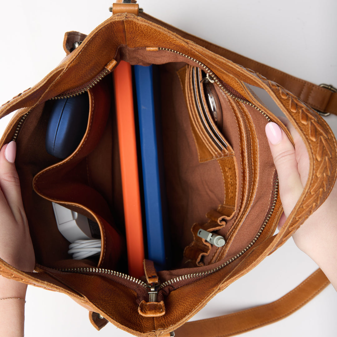 Stuffed interior view of full-grain leather Ava concealed carry tote crossbody bag by Confident Conceal