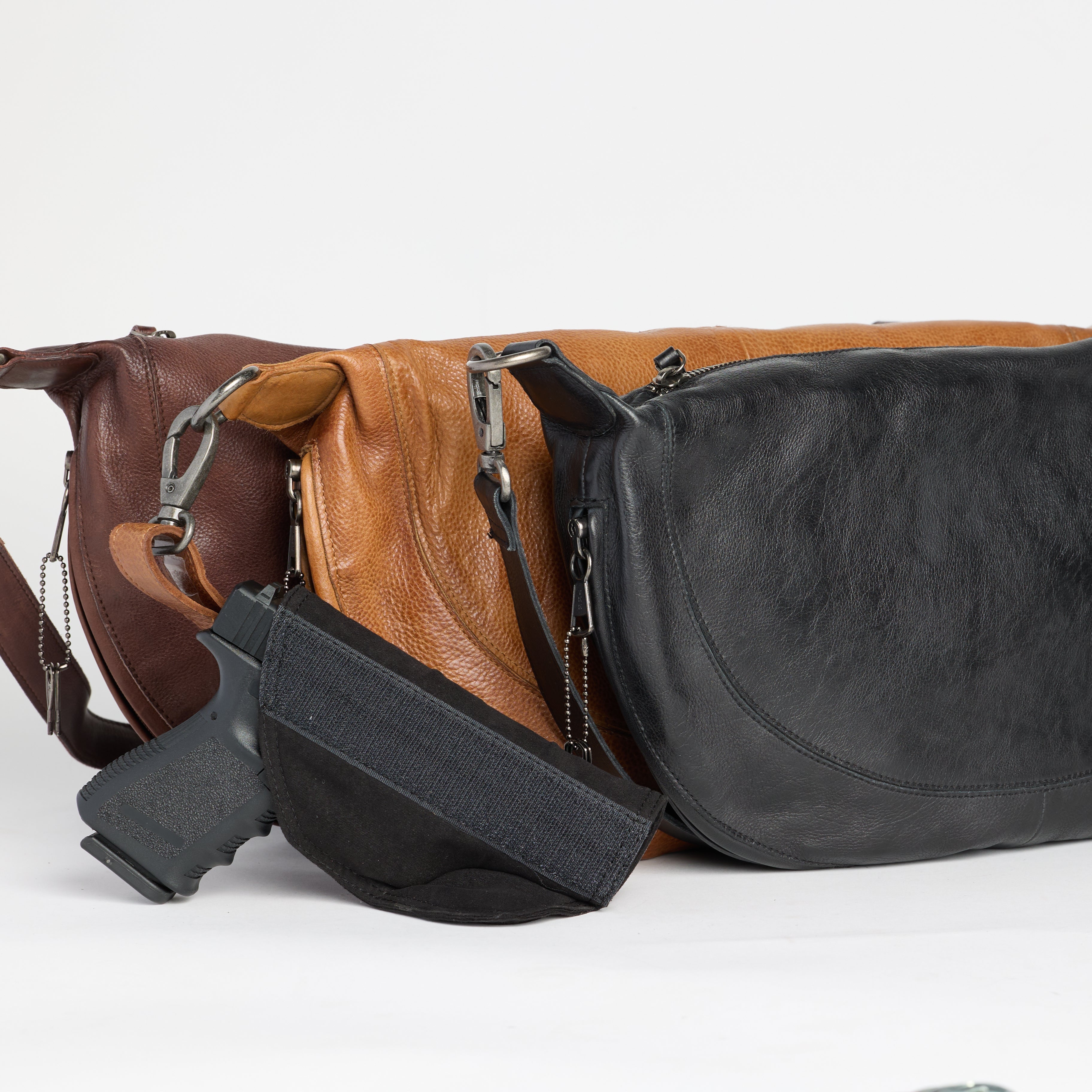Brown, cognac, and black full-grain leather Bonnie crossbody bags by Concealed Carry 