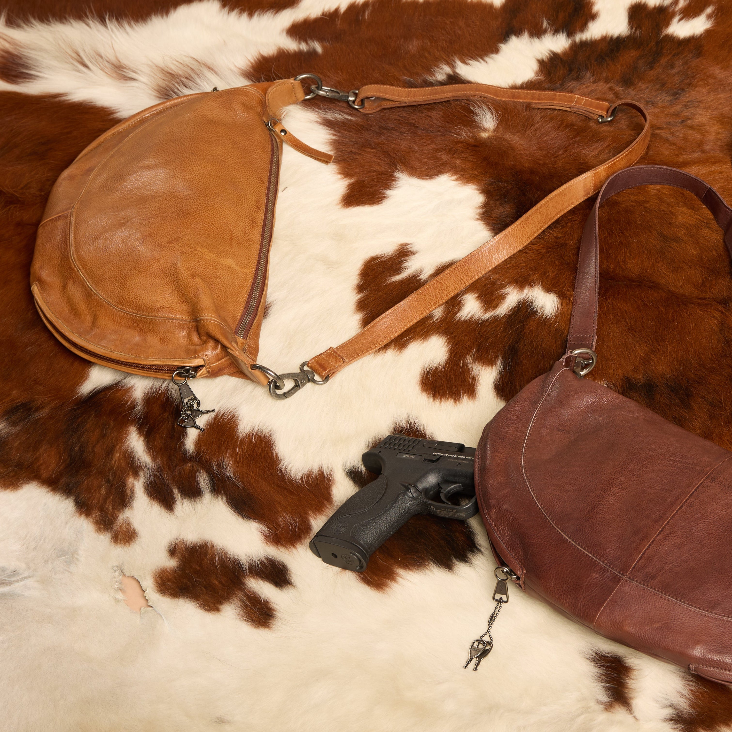 Brown and cognac full-grain leather Bonnie crossbody bags by Concealed Carry 